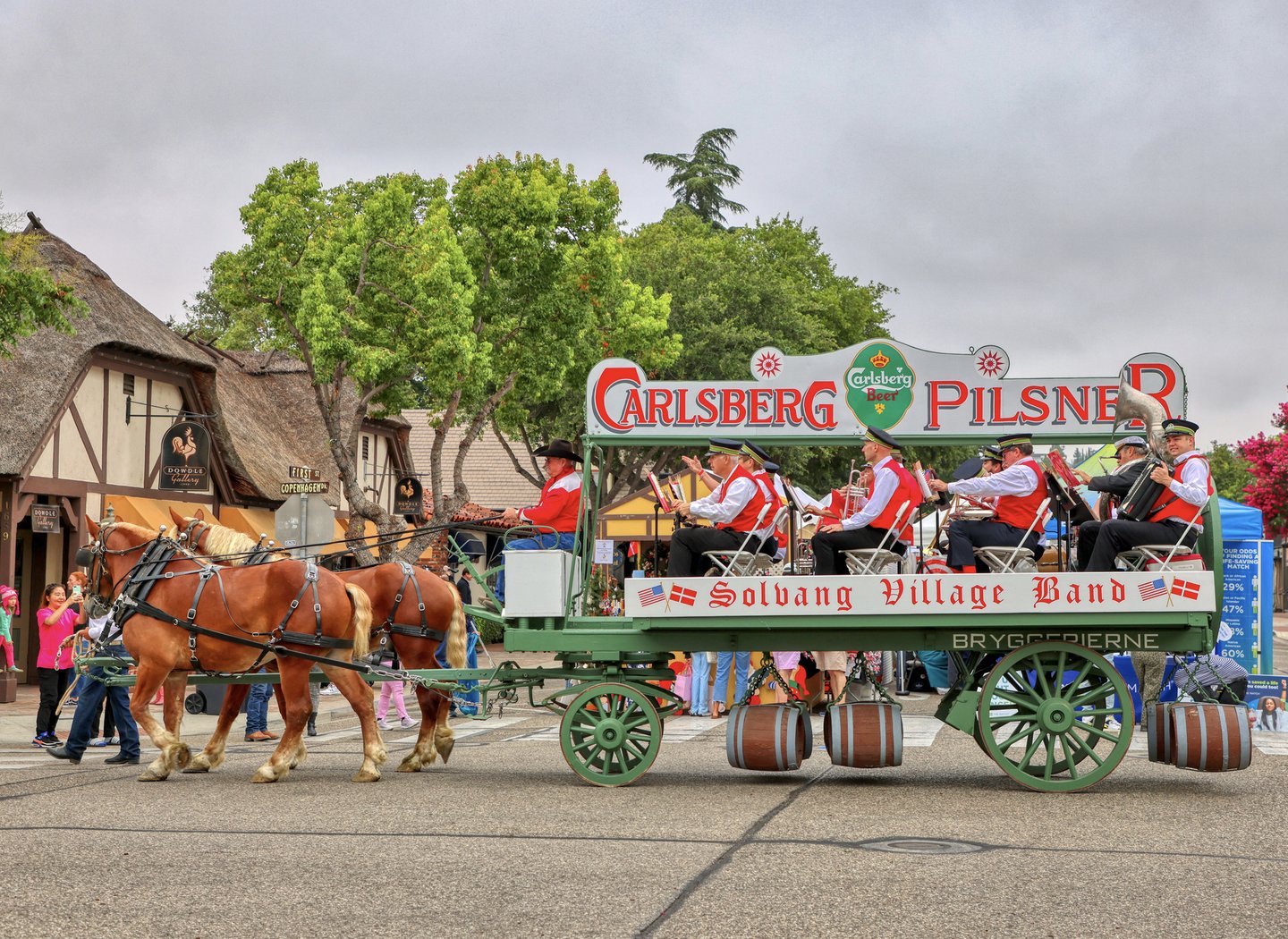 Horse-drawn Carlsberg wagon carrying the Solvang Village Band during the Danish Days parade